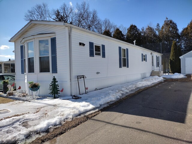 view of snow covered property