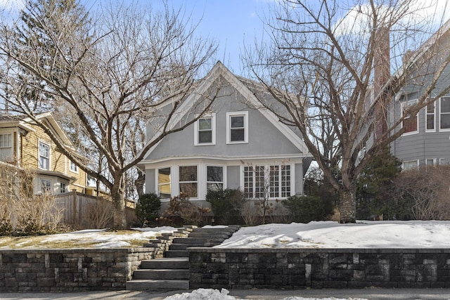 colonial inspired home with stucco siding