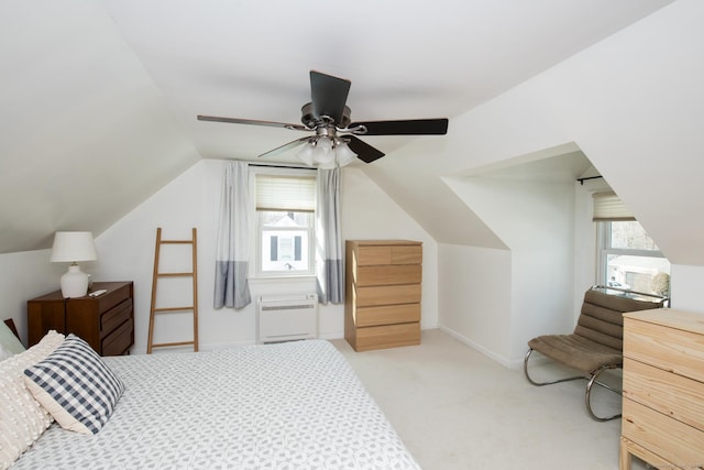 bedroom with lofted ceiling, light carpet, baseboards, and a ceiling fan