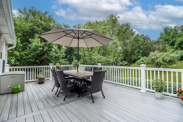 wooden deck with outdoor dining space