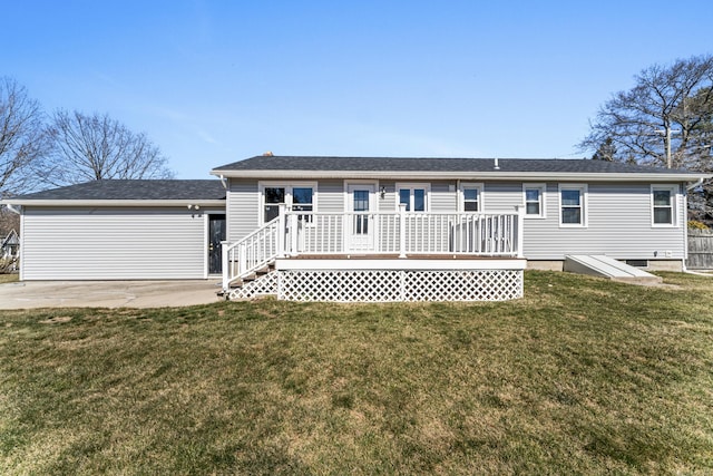 view of front facade featuring a deck and a front lawn