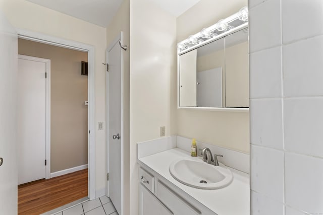 bathroom with vanity and tile patterned floors