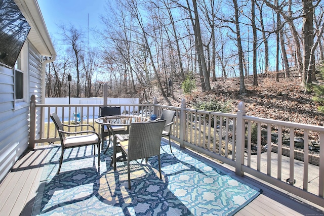 deck featuring outdoor dining space