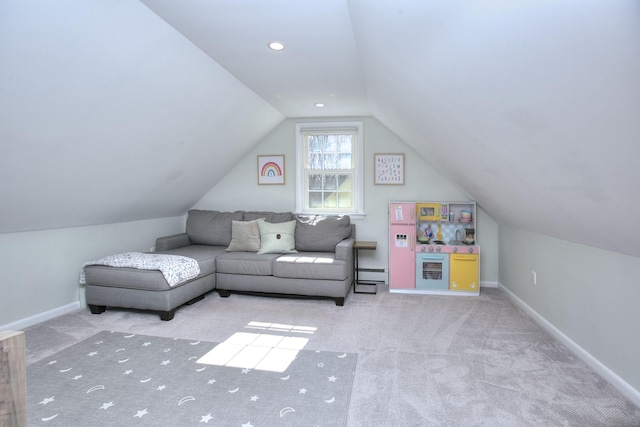 interior space with lofted ceiling, baseboard heating, baseboards, and recessed lighting