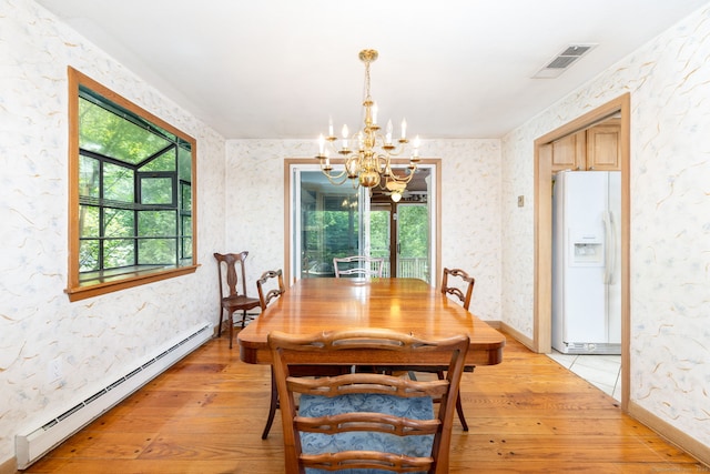 30 Holly Cir, Windsor, CT 06095 - dining space featuring a baseboard radiator, a chandelier, light wood-type flooring, and wallpapered walls