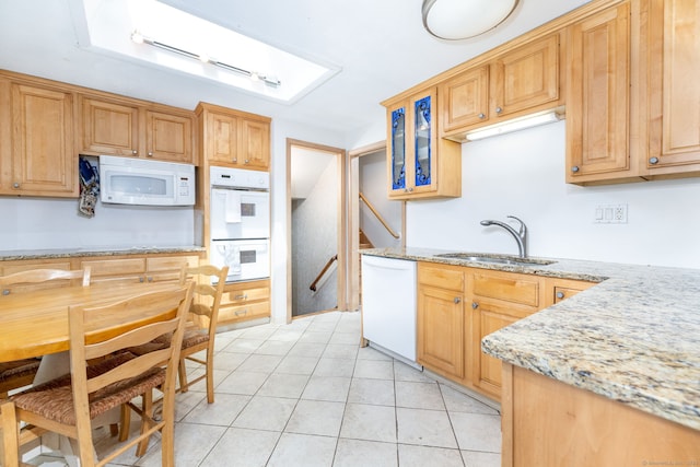 30 Holly Cir, Windsor, CT 06095 - kitchen with white appliances, light stone countertops, light tile patterned floors, and glass insert cabinets