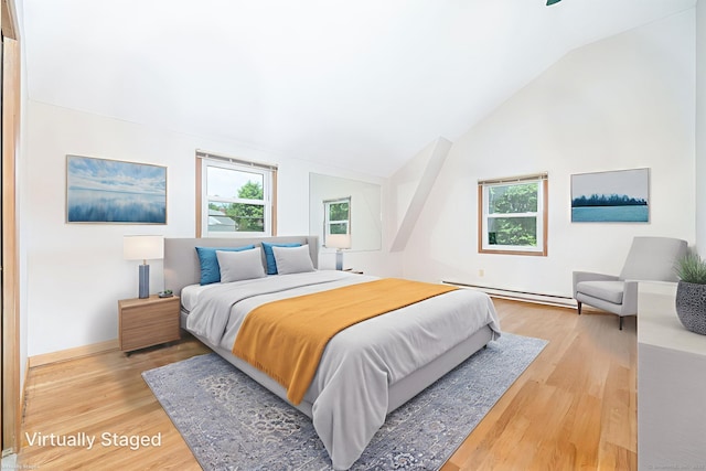 30 Holly Cir, Windsor, CT 06095 - bedroom featuring a baseboard radiator, wood finished floors, and lofted ceiling