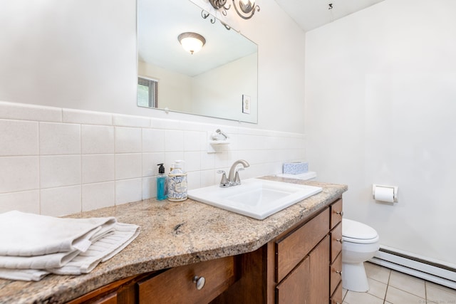 30 Holly Cir, Windsor, CT 06095 - bathroom with a baseboard radiator, vanity, and tile patterned floors
