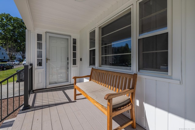 wooden deck featuring covered porch