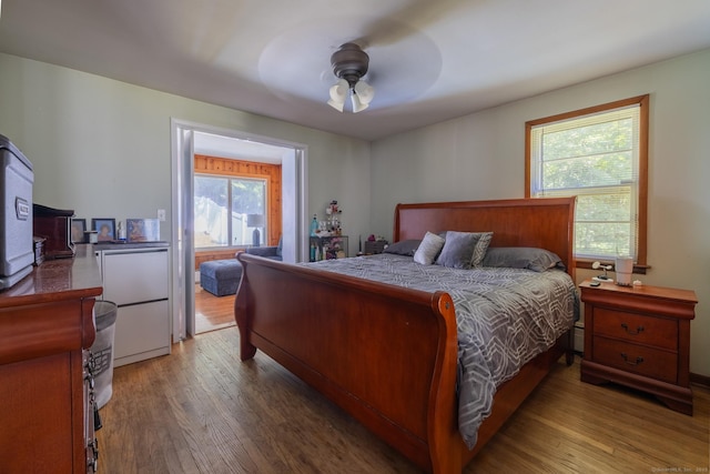 bedroom with wood finished floors and a ceiling fan