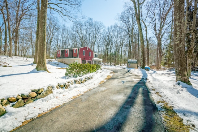 view of road with driveway