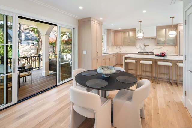 dining room featuring light wood-style floors and recessed lighting