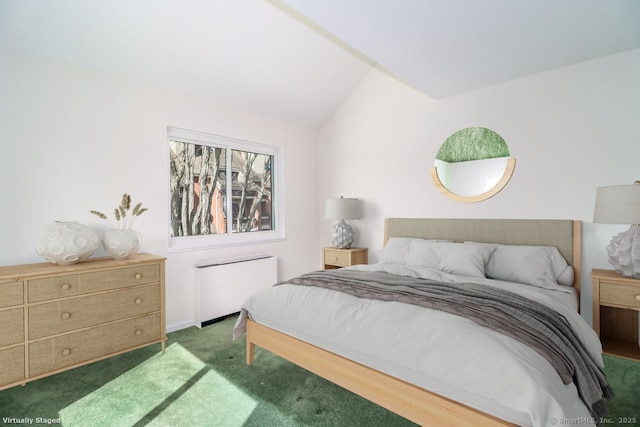 carpeted bedroom featuring radiator heating unit and lofted ceiling