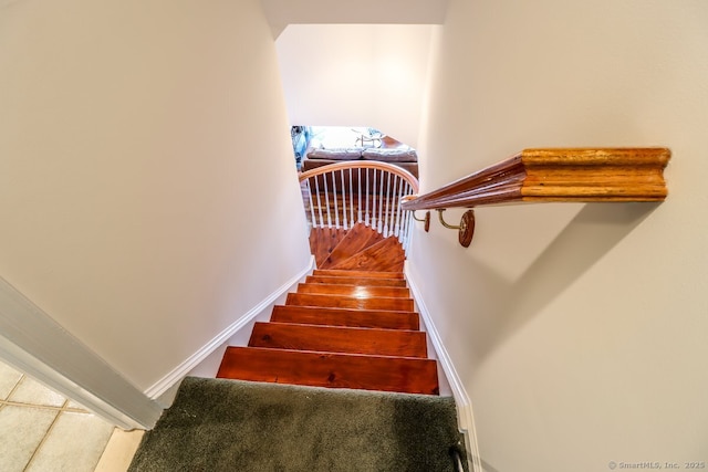 staircase with baseboards