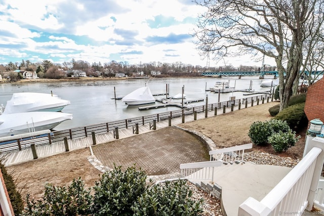 dock area with a water view