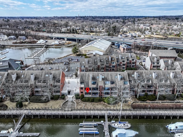 drone / aerial view with a water view