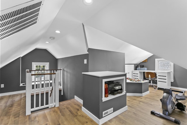 bonus room featuring recessed lighting, baseboards, lofted ceiling, and light wood-style flooring