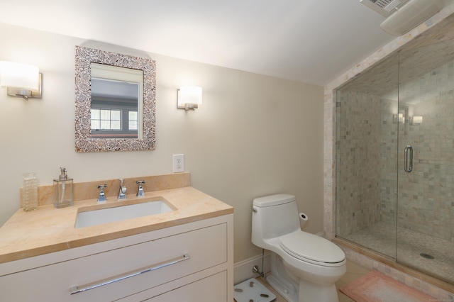 bathroom featuring a stall shower, visible vents, vanity, and toilet