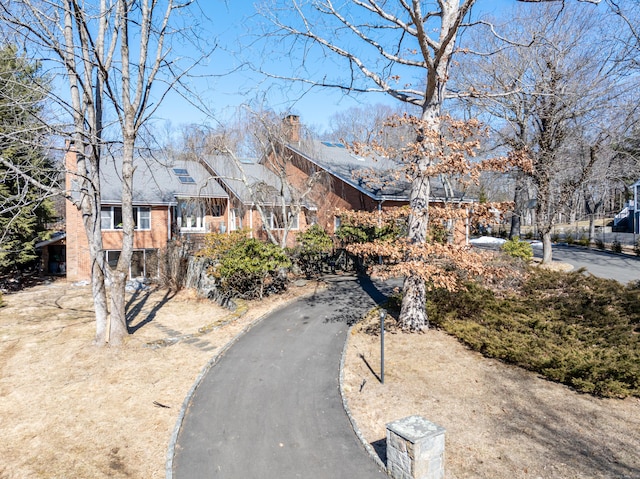 view of front of property featuring a chimney