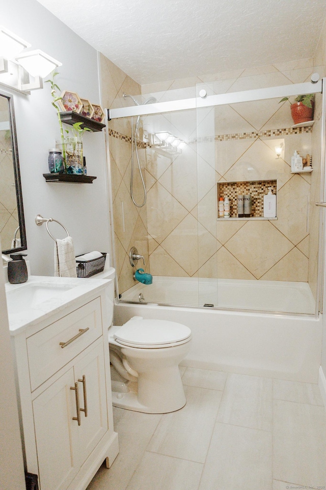 full bath featuring toilet, tile patterned flooring, enclosed tub / shower combo, and vanity