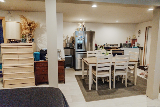 dining room with recessed lighting