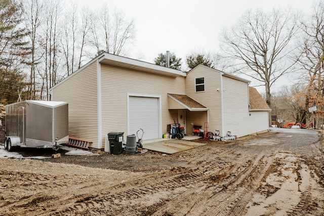 view of home's exterior featuring roof with shingles