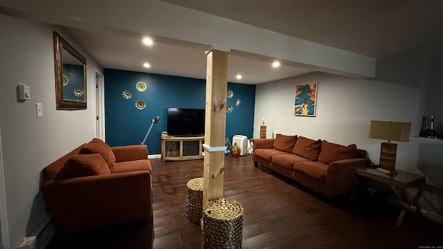 living area with recessed lighting, baseboards, and wood finished floors