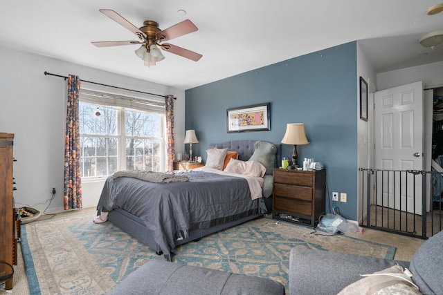 bedroom featuring carpet and a ceiling fan