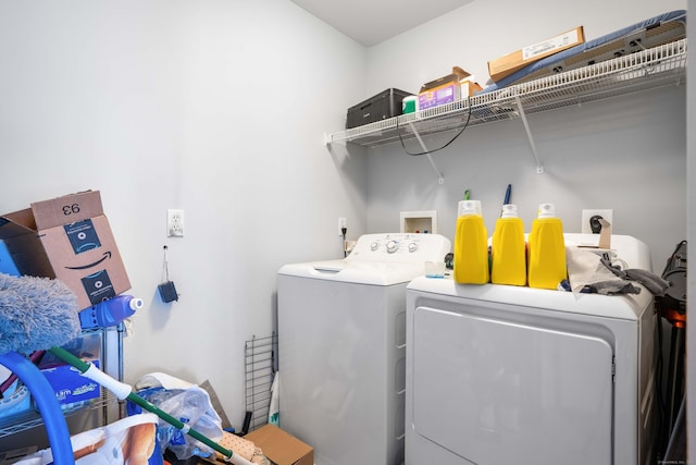 laundry area featuring laundry area and washer and dryer