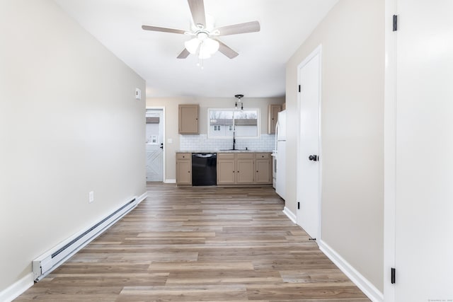 kitchen with a sink, light wood-style floors, decorative backsplash, baseboard heating, and dishwasher