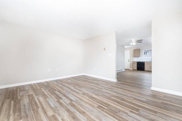 unfurnished living room featuring light wood-style flooring, a baseboard heating unit, baseboards, and ceiling fan