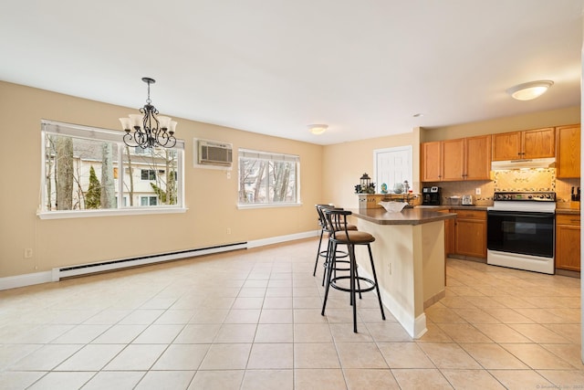 kitchen with tasteful backsplash, electric range, a baseboard heating unit, light tile patterned flooring, and a kitchen bar