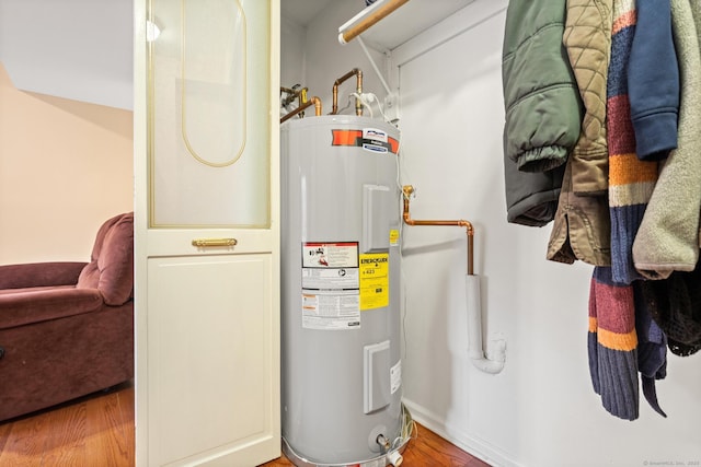 utility room with water heater