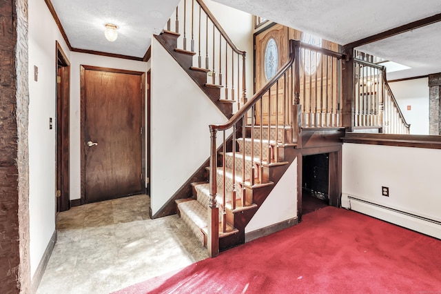 interior space with a textured ceiling, stairway, baseboards, and crown molding