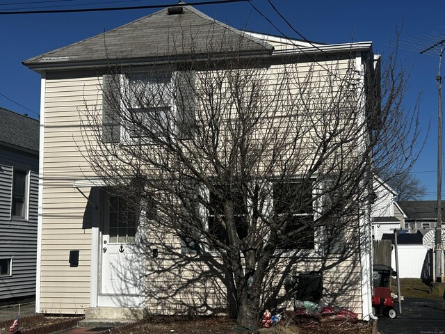 17 Blair St, Milford, CT 06460 - view of property exterior with a shingled roof and entry steps
