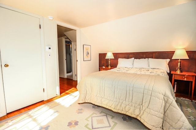 bedroom with light wood-type flooring