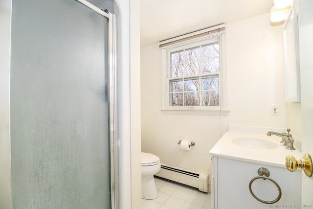 bathroom featuring toilet, a baseboard heating unit, a stall shower, vanity, and tile patterned flooring