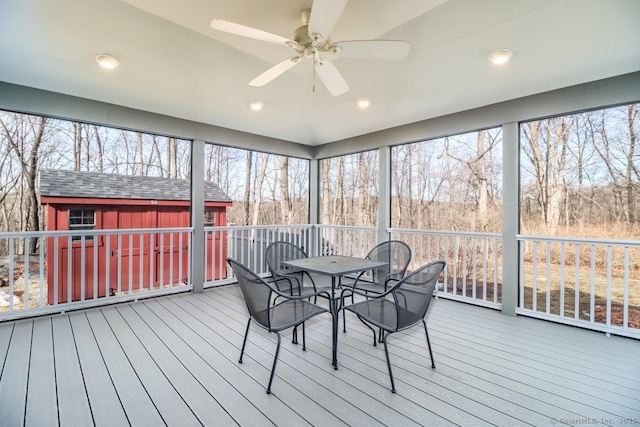 sunroom / solarium with ceiling fan