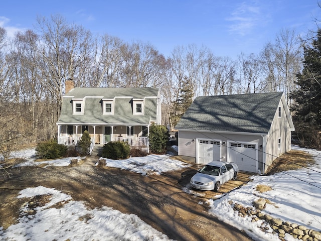 dutch colonial with covered porch and a chimney