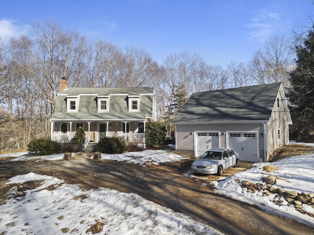 dutch colonial featuring a garage, dirt driveway, a chimney, and a porch