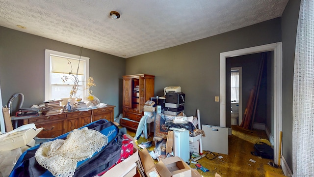 office with a textured ceiling and baseboards