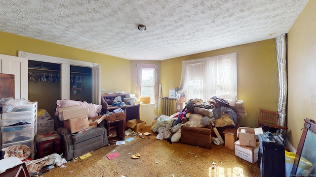 miscellaneous room featuring a textured ceiling