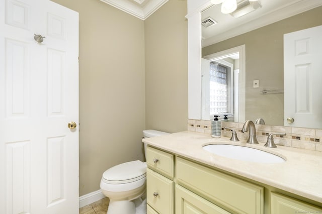 half bathroom featuring visible vents, toilet, ornamental molding, tile patterned flooring, and vanity