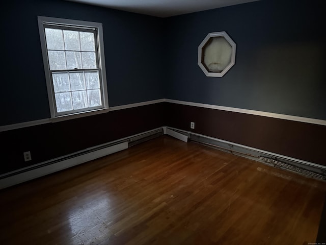 empty room featuring dark wood-type flooring