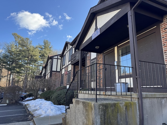 view of home's exterior featuring brick siding