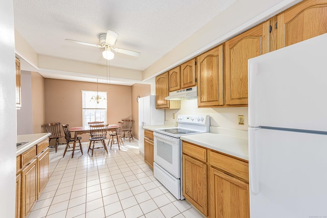 kitchen with white appliances, light tile patterned floors, a ceiling fan, light countertops, and under cabinet range hood