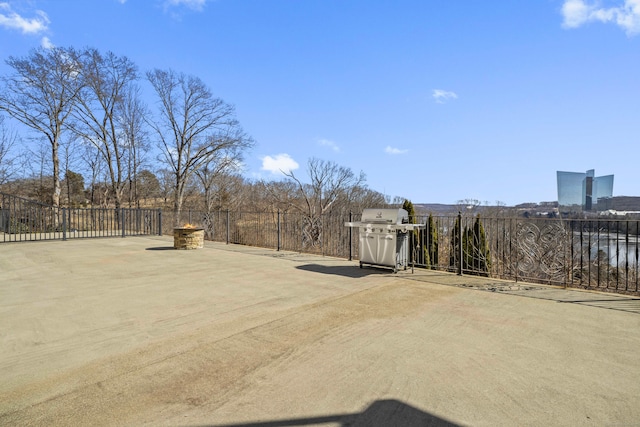 view of yard featuring fence and a patio