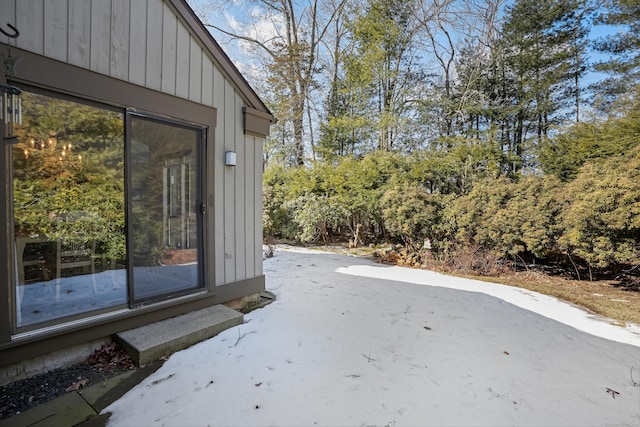 view of side of property with board and batten siding