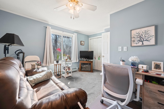 carpeted home office with ceiling fan and crown molding