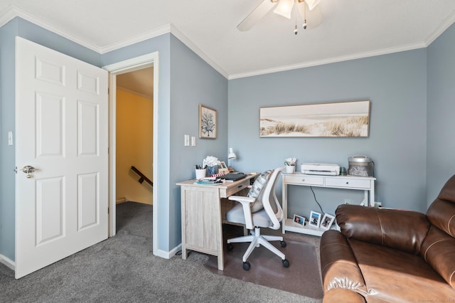 carpeted office space with ornamental molding, ceiling fan, and baseboards